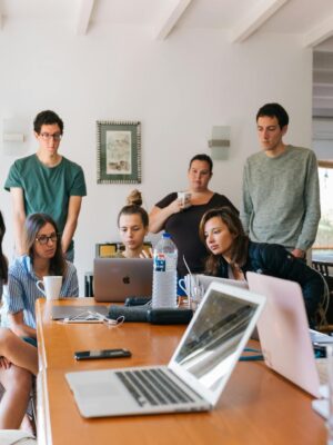 Group of People Watching on Laptop